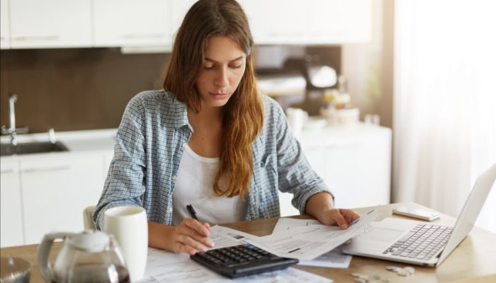 young-woman-checking-her-budget-doing-taxes-scaled_p36724_thumb_resized.jpg
