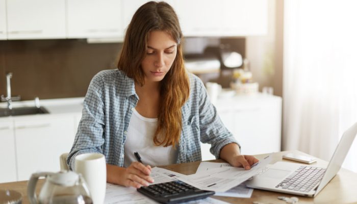 young-woman-checking-her-budget-doing-taxes-scaled_p36880_thumb_resized.jpg
